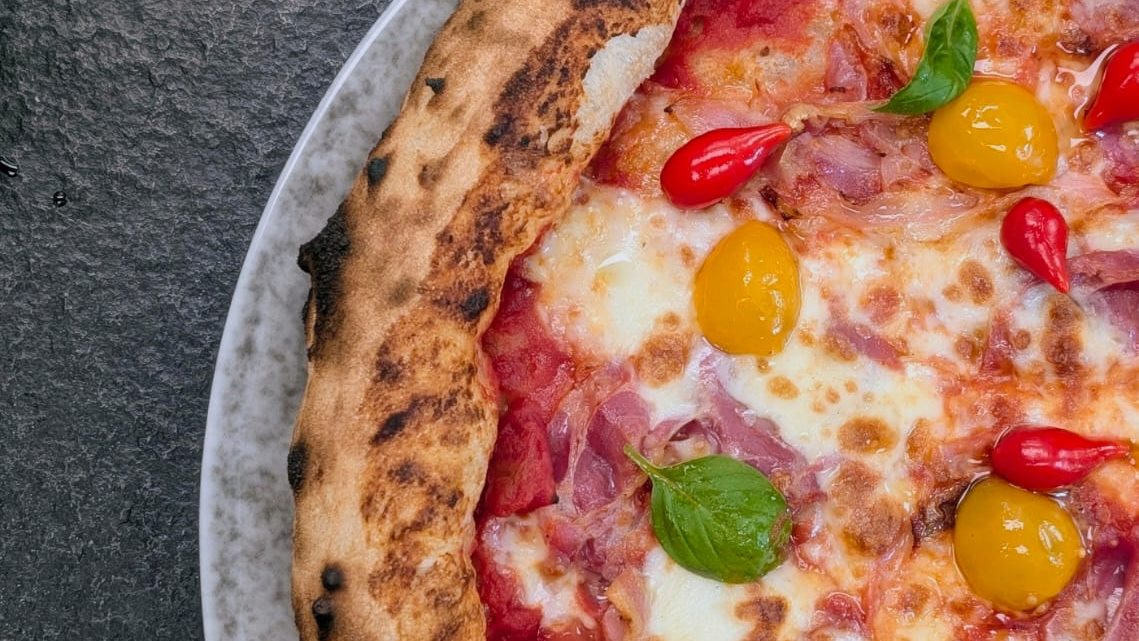 Neapolitan pizza: a tall, charred cornicione and melted mozzarella